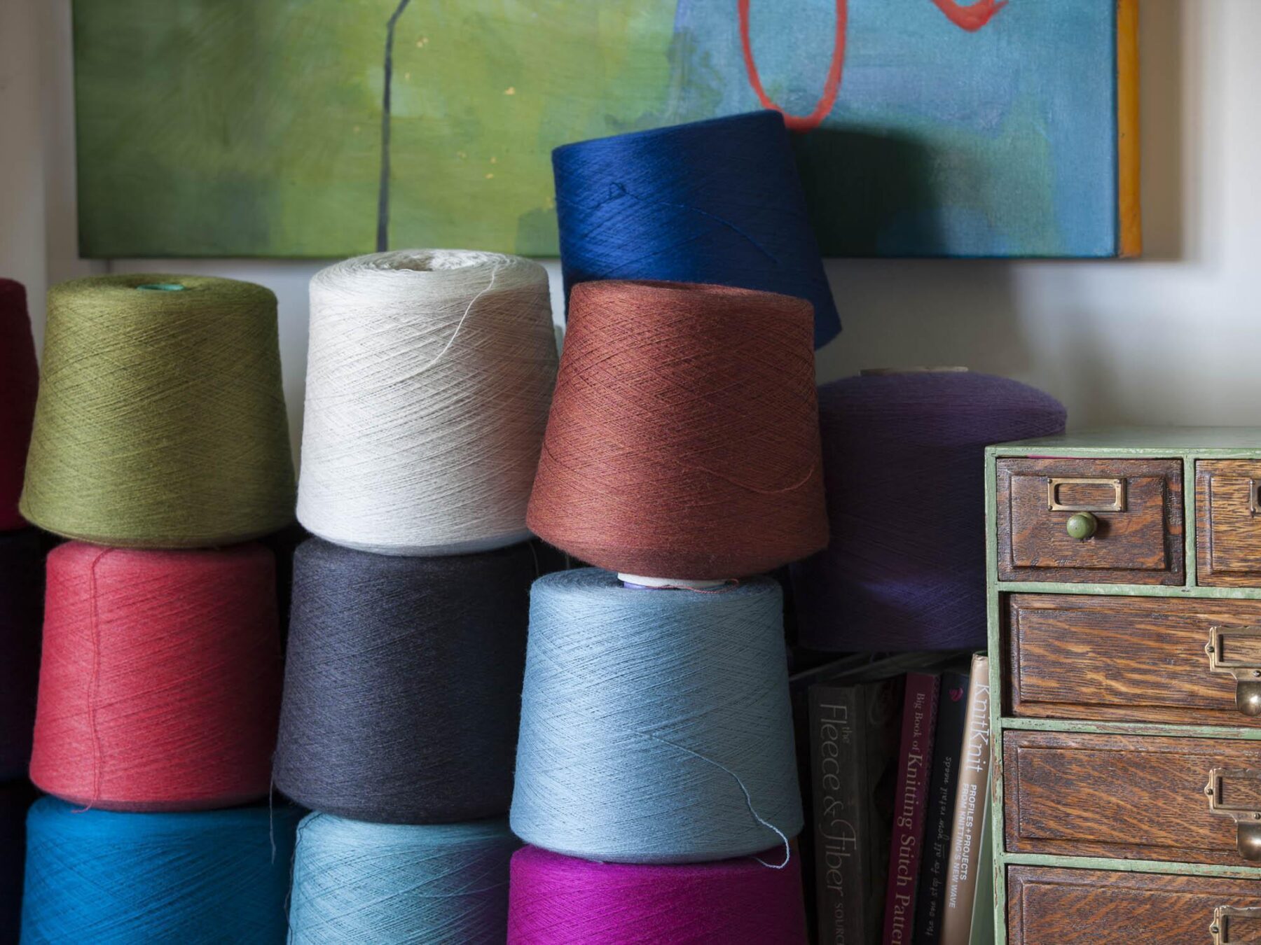 Wool cones, painting and wooden drawers in Nielanell studio, Shetland.